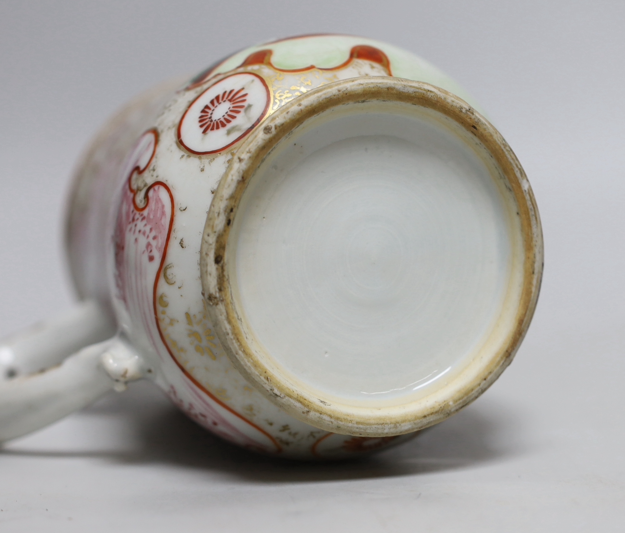 An 18th century Chinese export famille rose mug, 15.5cm high